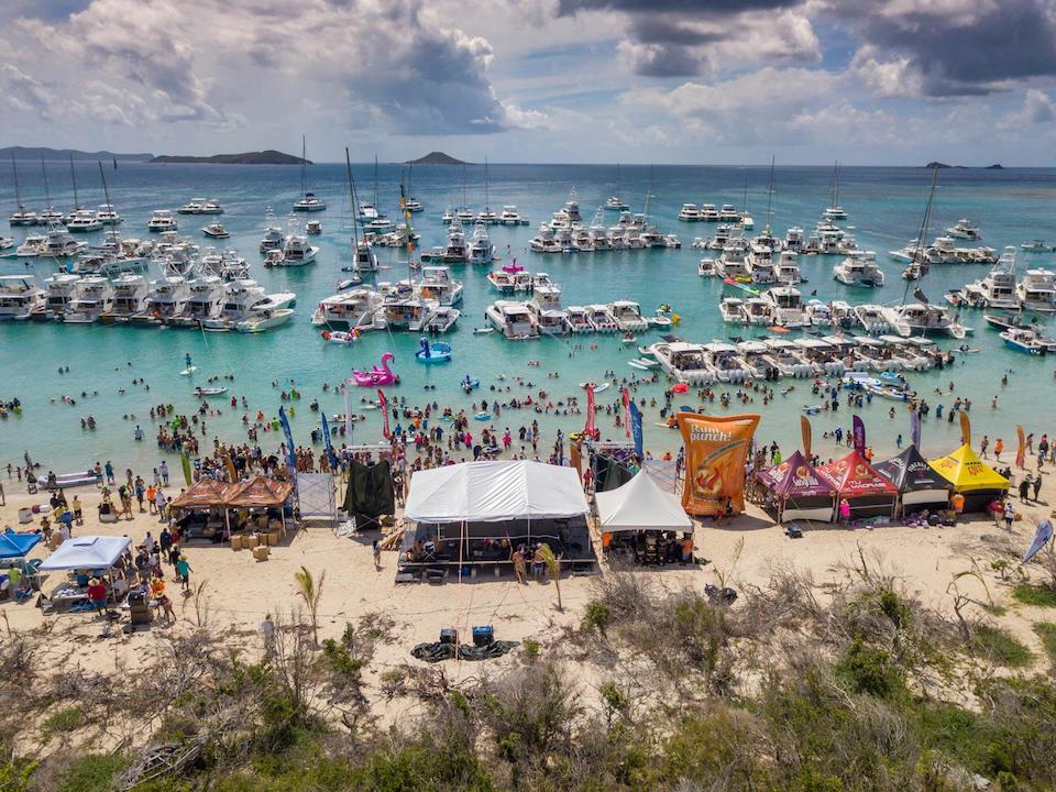 Hundreds of boats and partygoers gathered in turquoise water for Christmas in July in the BVI