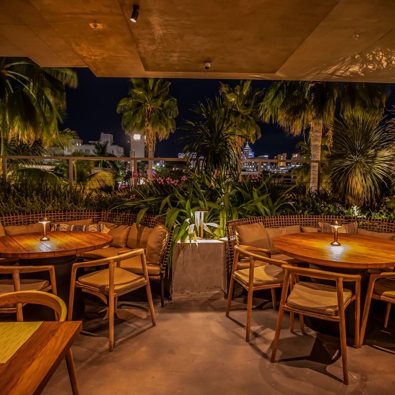 MILA’s atmospheric rooftop dining terrace in Miami Beach